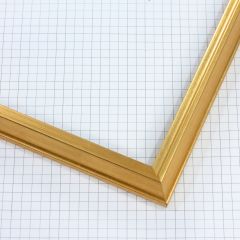 This 3/4 " profile frame features a very small edged extended back design with a delicate lip, finished in genuine gold leaf. Its graceful contours and luminous golden tone offer a refined, classic elegance—perfect for enhancing fine art, photography, or traditional décor.
