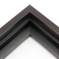 This solid wood canvas floater frame features a dark brown matte finish with wood grain detailing.  

Display your favourite gallery wrapped Giclée print or painting with authentic, fine art style. This floater frame is ideal for medium to extra large canvases mounted on thick (1.5 " deep) stretcher bars.

*Note: These solid wood, custom canvas floaters are for stretched canvas prints and paintings, and raised wood panels.