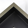 This Large, L-shaped floating contemporary canvas frame in matte black features a thin brushed silver face.

*Note: These solid wood, custom canvas floaters are for stretched canvas prints and paintings, and raised wood panels.