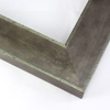 Slightly angled 2-3/8 " frame with an indented design on the inner and outer edge. The face is metallic silver stain brushed over a dark grey base. The accented inner and outer edge reveal a mint green patina which highlights the difference in texture.