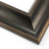 This bold frame features a steep reverse scoop profile with a broken line detail on matte black. The inner lip drops sharply in toward the image; both edges are brushed with a subtle bronze leaf.
3 " width: ideal for large or oversize artwork. Select a strong image for this frame, to ensure the heavy border doesn